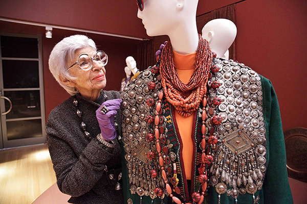 Iris helps carefully install her ensembles. Photo by PEM Walter Silver.